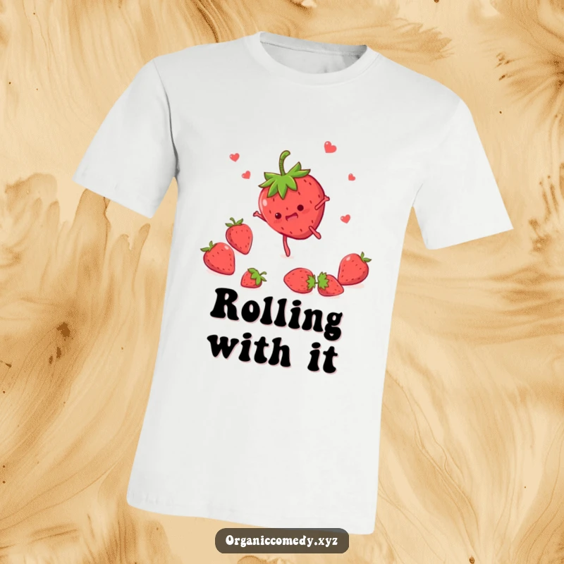 Funny strawberry character with tiny legs performing a joyful somersault, printed on a soft and comfortable t-shirt.