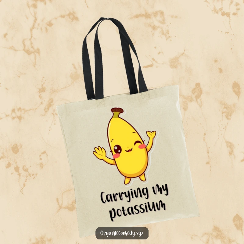 Funny, bright yellow banana character with eyes wide with mirth doing a silly wave, featured on a sturdy and amusing tote bag.